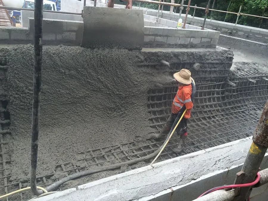 Civil concrete pour in progress with a boom pump — Far Northern Concrete Pumping, servicing Atherton QLD