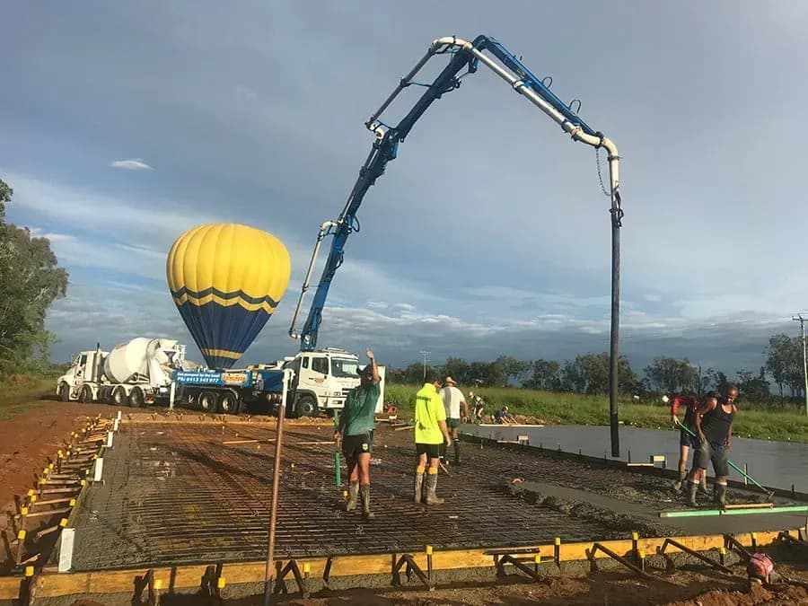 Construction site with concrete being poured — Far Northern Concrete Pumping, servicing Clifton Beach QLD