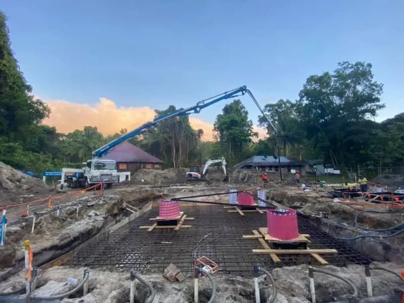 Construction Site Concrete Pump Truck Pouring Concrete — Far Northern Concrete Pumping, servicing Earlville QLD