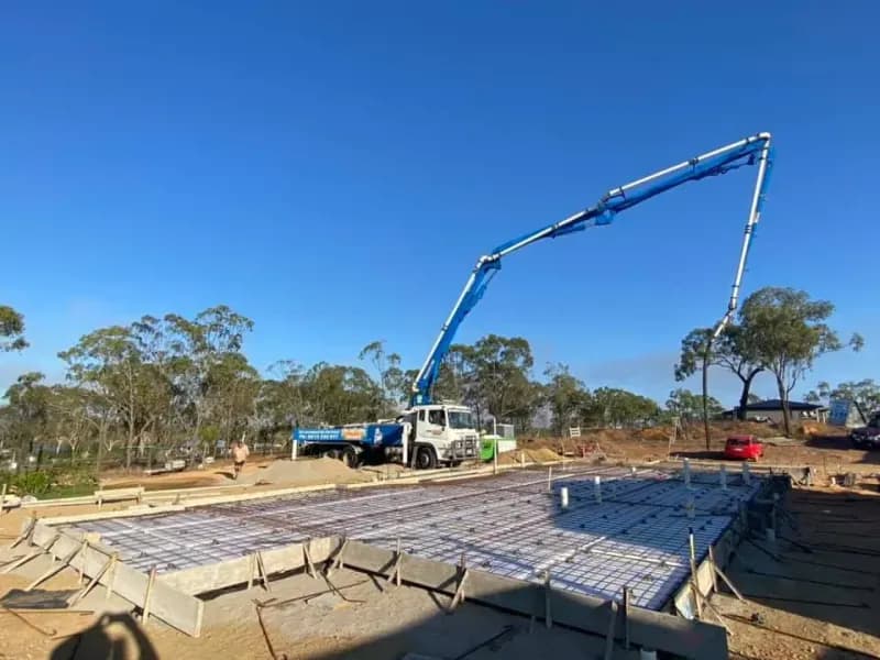 Concrete Pump Truck Pouring Concrete — Far Northern Concrete Pumping, servicing Clifton Beach QLD