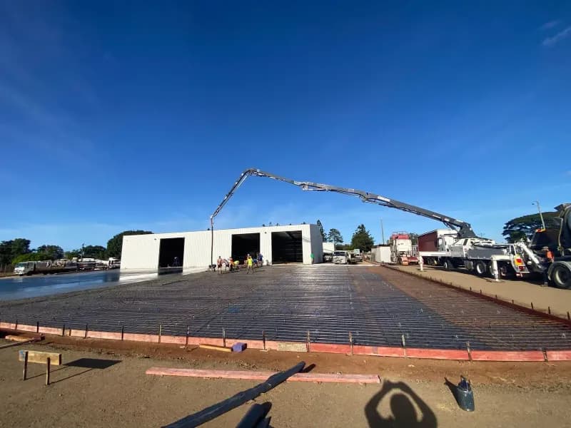 Construction Site Concrete Being Poured by a Pump Truck — Far Northern Concrete Pumping, servicing Earlville QLD