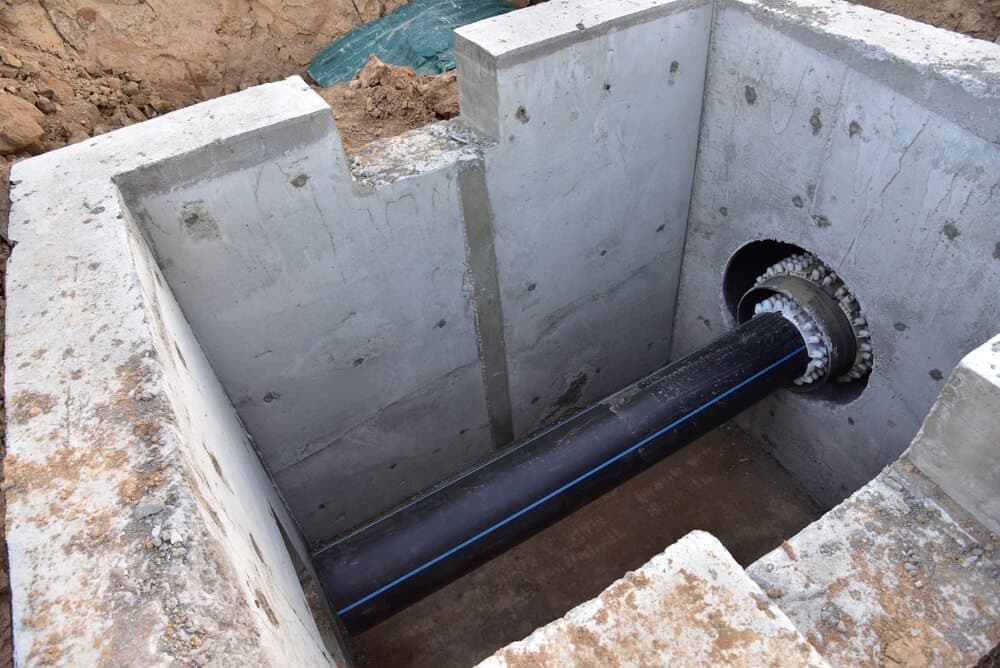 Concrete Structure With a Black Pipe — Far Northern Concrete Pumping in Tablelands, QLD