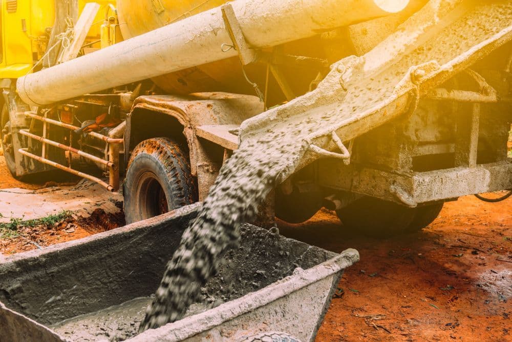 Concrete pump truck working on a site in the Tablelands